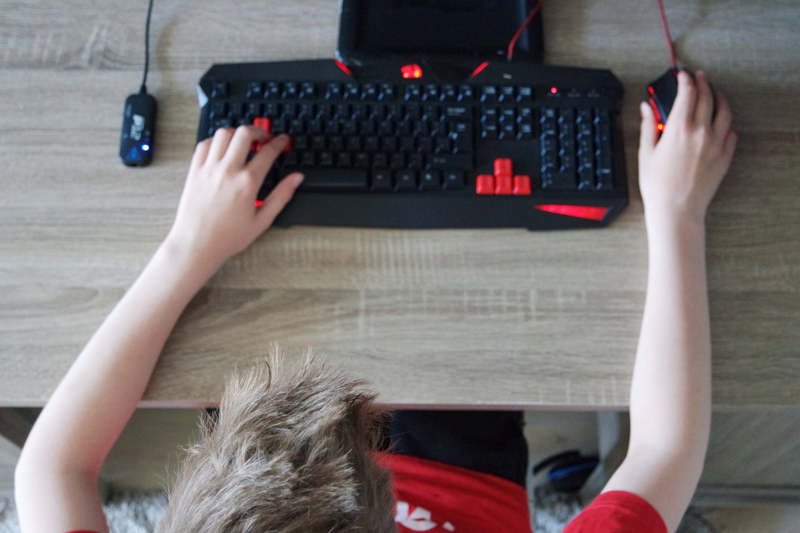 A Kid Using a Laptop for School